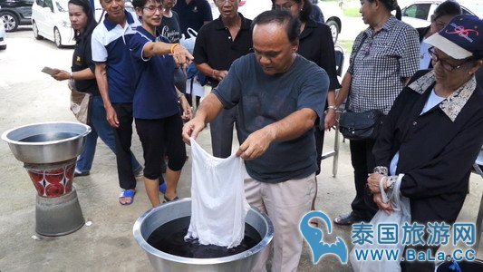 泰国黑衣紧缺 相关部门免费教学染黑布