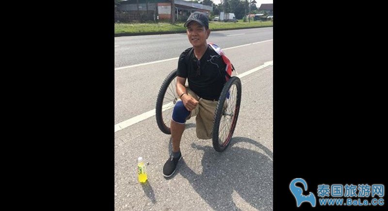 泰国残疾男子仅用单脚前往曼谷为泰国王吊唁