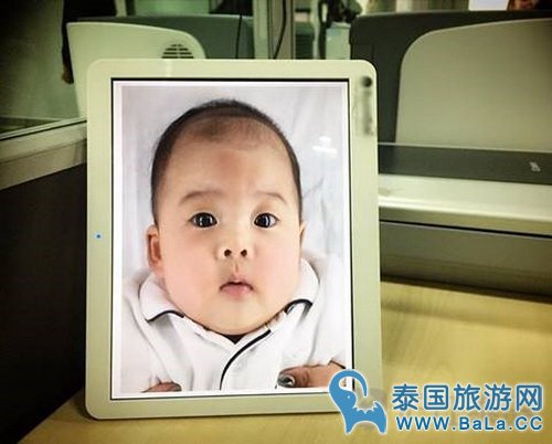 徐志贤和妻子Gubgib携女儿拍史上最萌的护照照片